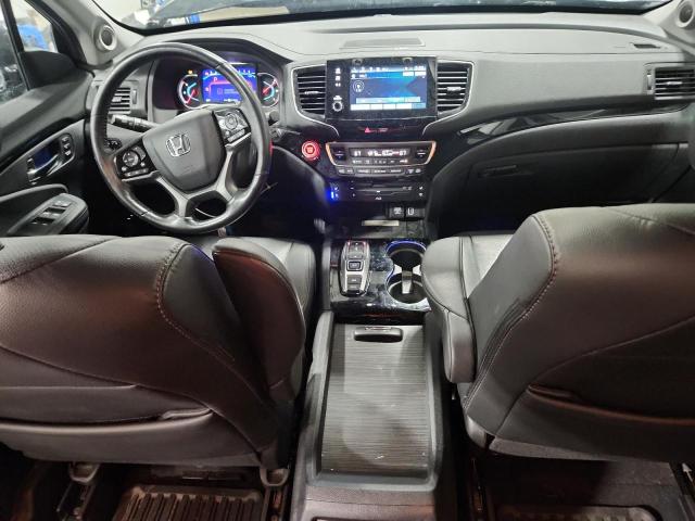 Photo 8 from auction – 2021 HONDA PILOT ELIT with VIN 5FNYF6H07MB051981