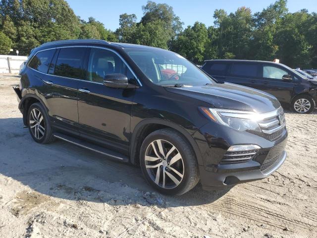 Photo 4 from auction – 2016 HONDA PILOT ELIT with VIN 5FNYF6H04GB071643