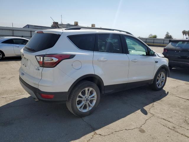 Photo 3 from auction – 2017 FORD ESCAPE SE with VIN 1FMCU9G91HUA26097