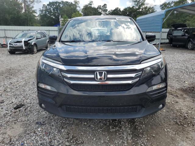 Photo 5 from auction – 2016 HONDA PILOT with VIN 5FNYF5H5XGB057087