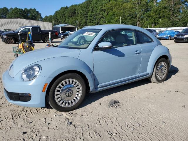 VOLKSWAGEN BEETLE 2014 with VIN 3VWJ17AT3EM633743 - Photo from auction