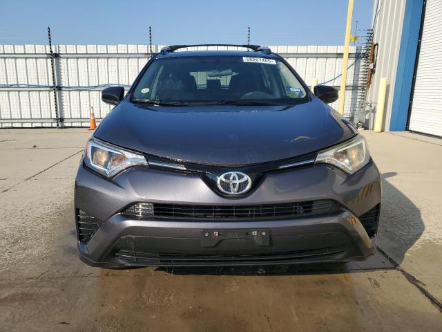 Photo 5 from auction – 2016 TOYOTA RAV4 LE with VIN JTMZFREVXGJ094763