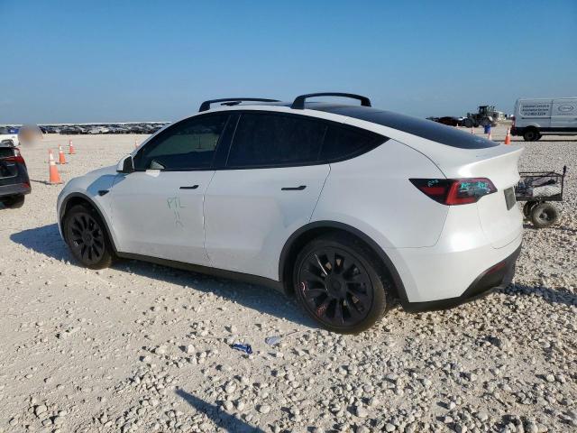 Photo 2 from auction – 2021 TESLA MODEL Y with VIN 5YJYGAEE1MF214656