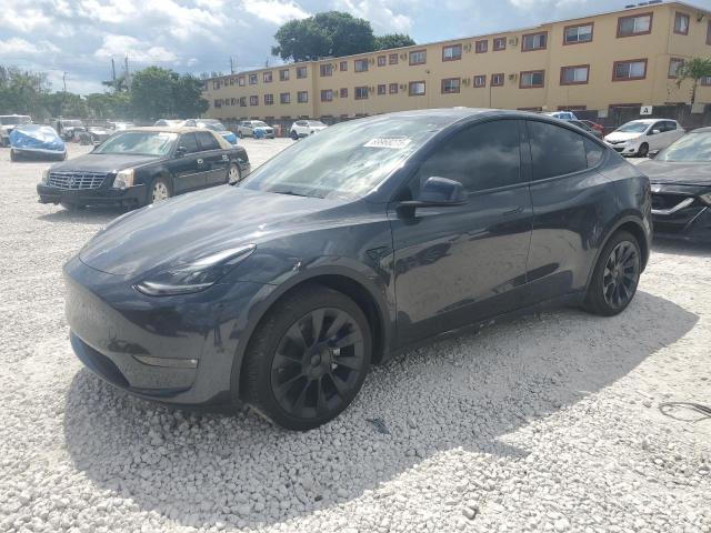 TESLA MODEL Y 2024 with VIN 7SAYGDEE4RF037807 - Photo from auction