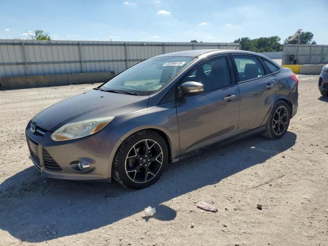 FORD FOCUS SE 2014 with VIN 1FADP3F26EL165909 - Photo from auction
