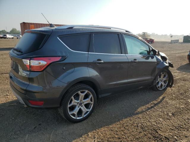 Photo 3 from auction – 2018 FORD ESCAPE TIT with VIN 1FMCU0J98JUD47421