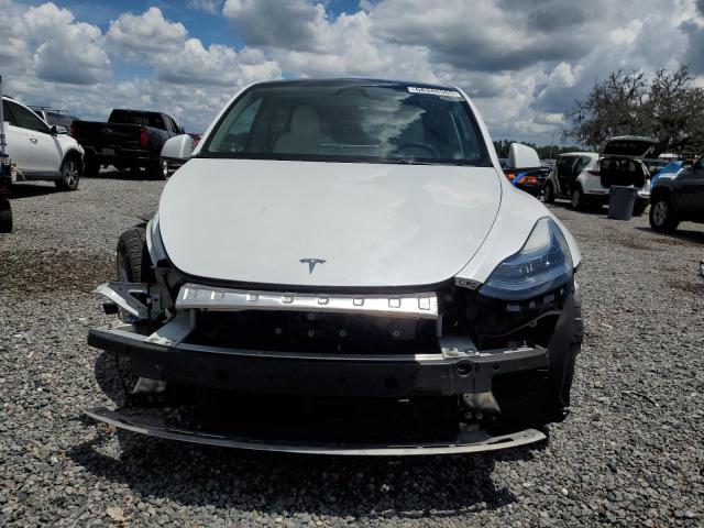 Photo 5 from auction – 2023 TESLA MODEL Y with VIN 7SAYGDEE8PA147687