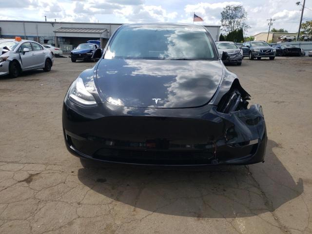Photo 5 from auction – 2023 TESLA MODEL Y with VIN 7SAYGDEE0PA123562