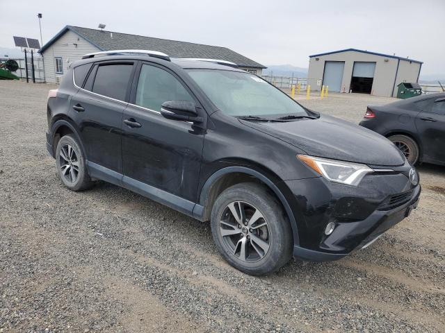 Photo 4 from auction – 2016 TOYOTA RAV4 XLE with VIN 2T3RFREV8GW461788