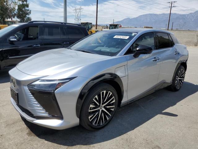 LEXUS RZ 450E 2023 with VIN JTJAAAAB4PA013522 - Photo from auction