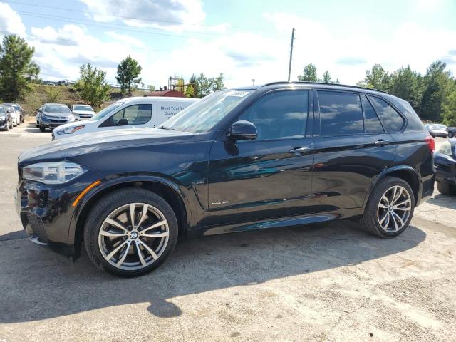 BMW X5 XDRIVE5 2014 with VIN 5UXKR6C59E0J72333 - Photo from auction