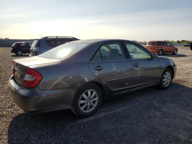 Photo 3 from auction – 2002 TOYOTA CAMRY LE with VIN JTDBF30KX20041720