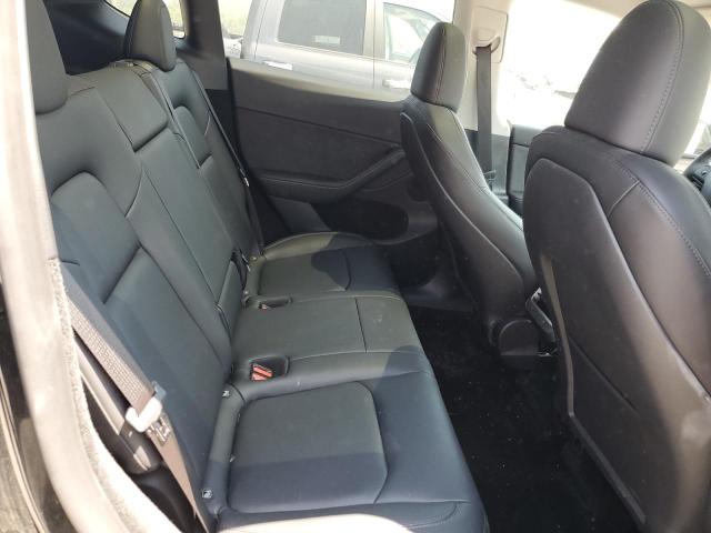 Photo 11 from auction – 2023 TESLA MODEL Y with VIN 7SAYGDEF6PF866836