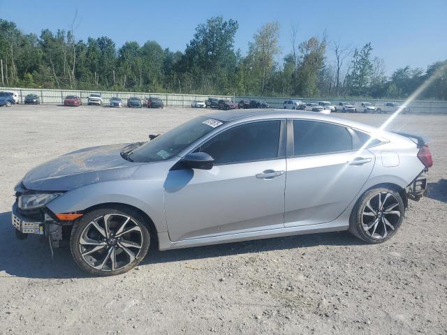 HONDA CIVIC 2019 with VIN 2HGFC1E57KH703168 - Photo from auction