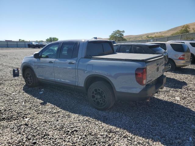 Photo 2 from auction – 2023 HONDA RIDGELINE with VIN 5FPYK3F77PB012491