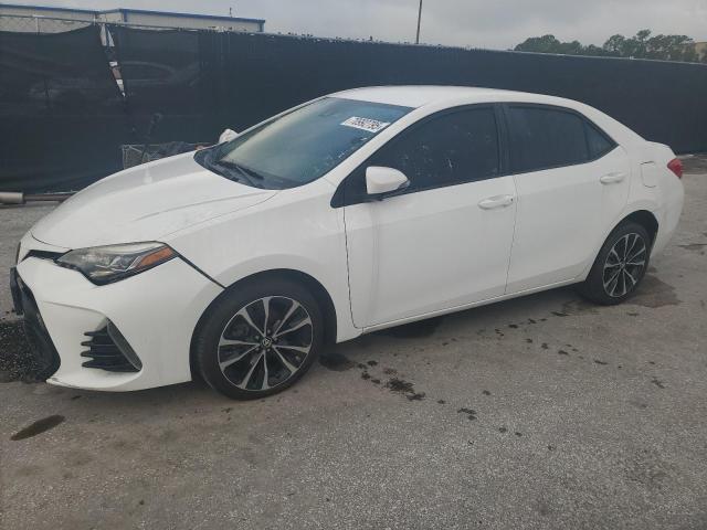 TOYOTA COROLLA L 2017 with VIN 2T1BURHE6HC832199 - Photo from auction