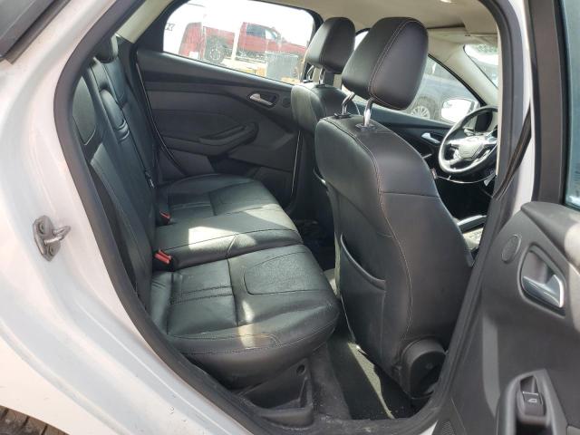 Фото 11 с аукциона – 2012 FORD FOCUS SEL с VIN 1FAHP3H22CL320354