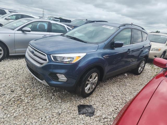 FORD ESCAPE SE 2018 with VIN 1FMCU9GD6JUB80380 - Photo from auction