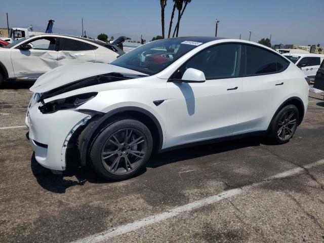 TESLA MODEL Y 2025 with VIN 7SAYGDED7SF321638 - Photo from auction