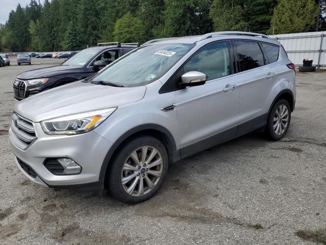 FORD ESCAPE TIT 2017 with VIN 1FMCU0J93HUD04521 - Photo from auction