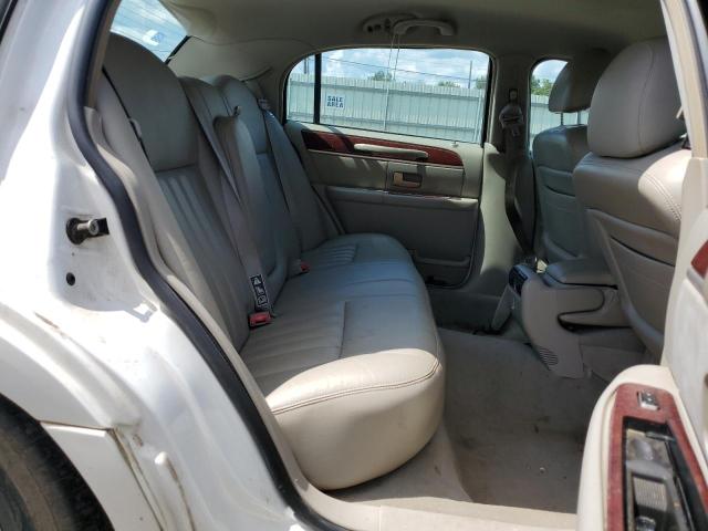 Photo 10 from auction – 2004 LINCOLN TOWN CAR E with VIN 1LNHM81W74Y632781