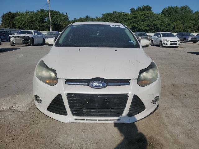Photo 5 from auction – 2014 FORD FOCUS TITANIUM with VIN 1FADP3J26EL218485