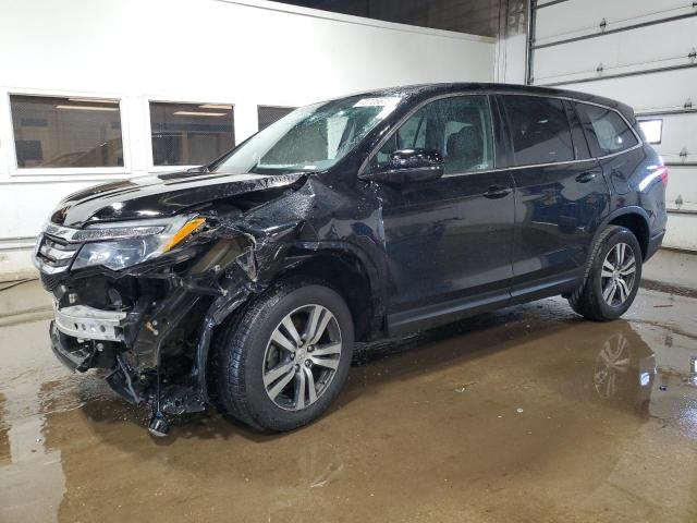 HONDA PILOT EXL 2018 with VIN 5FNYF5H5XJB016448 - Photo from auction