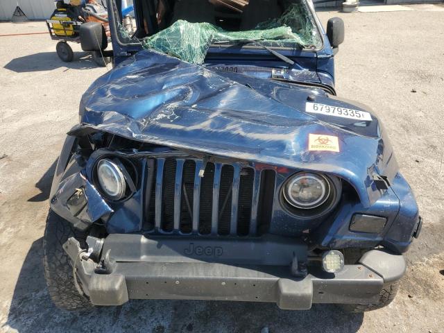 Photo 11 from auction – 2003 JEEP WRANGLER COMMANDO with VIN 1J4FA39S43P357281
