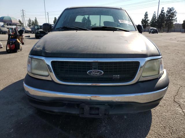 Photo 5 from auction – 2003 FORD F150 SUPER with VIN 1FTRW07693KB05404
