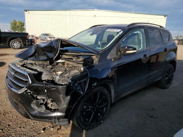 FORD ESCAPE TITANIUM 2017 with VIN 1FMCU9J94HUE77968 - Photo from auction