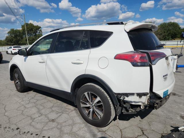 Photo 2 from auction – 2016 TOYOTA RAV4 XLE with VIN JTMWFREV9GJ064172