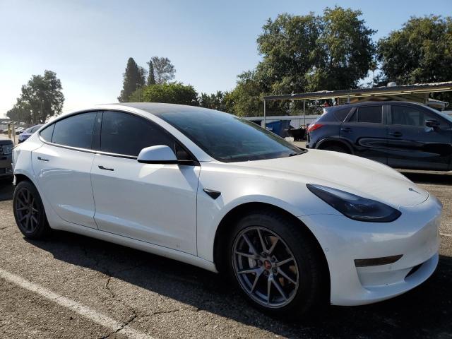 Photo 4 from auction – 2021 TESLA MODEL 3 with VIN 5YJ3E1EA4MF074809