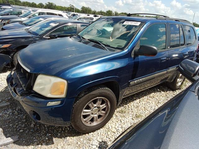 GMC ENVOY 2002 with VIN 1GKDT13S222133883 - Photo from auction