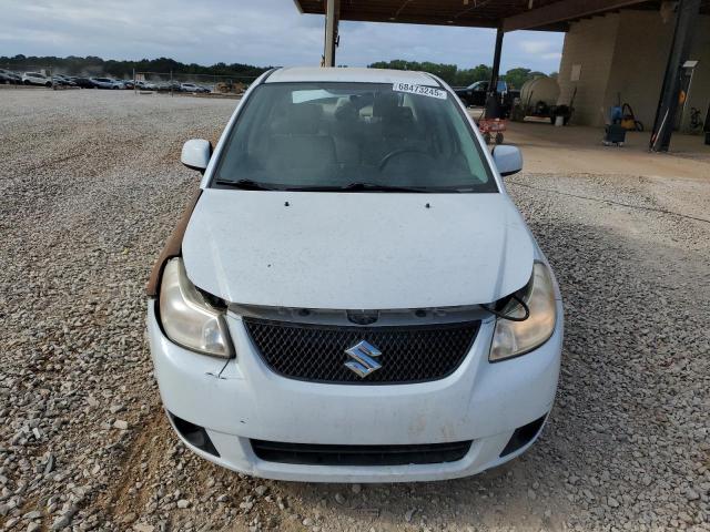 Photo 5 from auction – 2012 SUZUKI SX4 LE with VIN JS2YC5A34C6305539