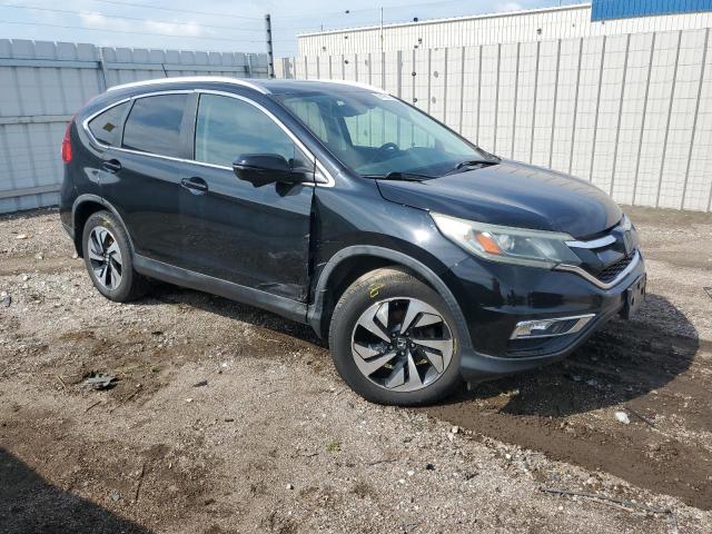 Photo 4 from auction – 2015 HONDA CR-V TOURING with VIN 5J6RM4H97FL062776