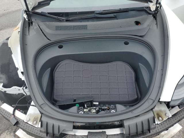 Photo 11 from auction – 2021 TESLA MODEL 3 with VIN 5YJ3E1EA5MF090386