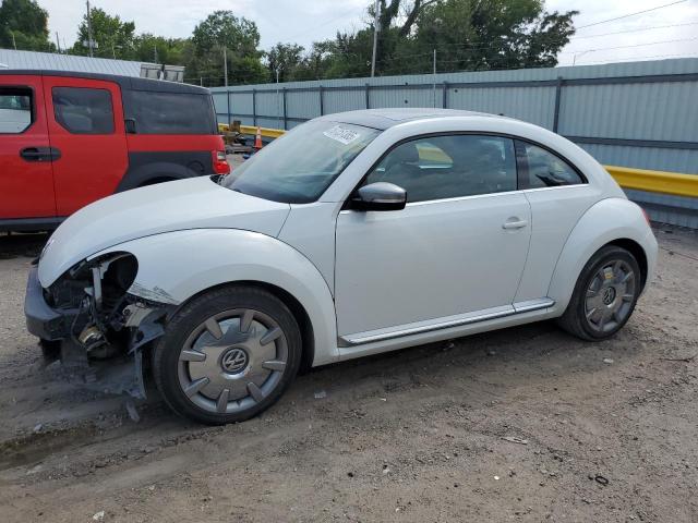 VOLKSWAGEN BEETLE 2014 with VIN 3VWJL7AT4EM656653 - Photo from auction