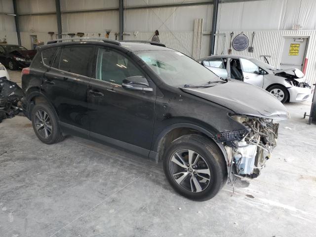 Photo 4 from auction – 2017 TOYOTA RAV4 XLE with VIN 2T3RFREV8HW594472