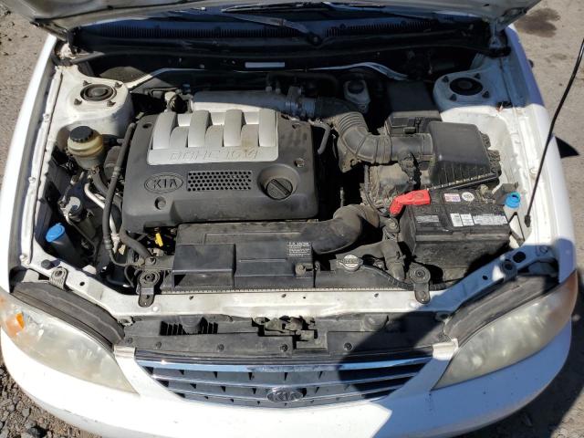 Photo 11 from auction – 2003 KIA SPECTRA BASE with VIN KNAFB121135286638