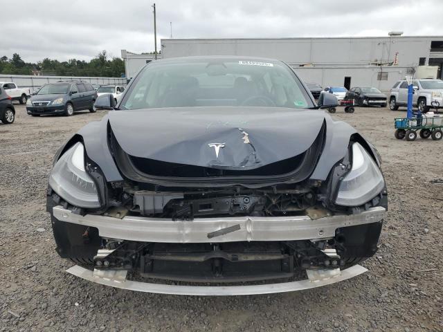 Photo 5 from auction – 2021 TESLA MODEL 3 with VIN 5YJ3E1EBXMF975076