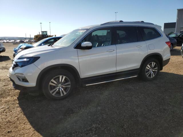 HONDA PILOT EXL 2016 with VIN 5FNYF6H52GB503979 - Photo from auction