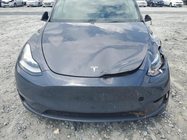 Photo 11 from auction – 2023 TESLA MODEL Y with VIN 7SAYGDEE0PA155587