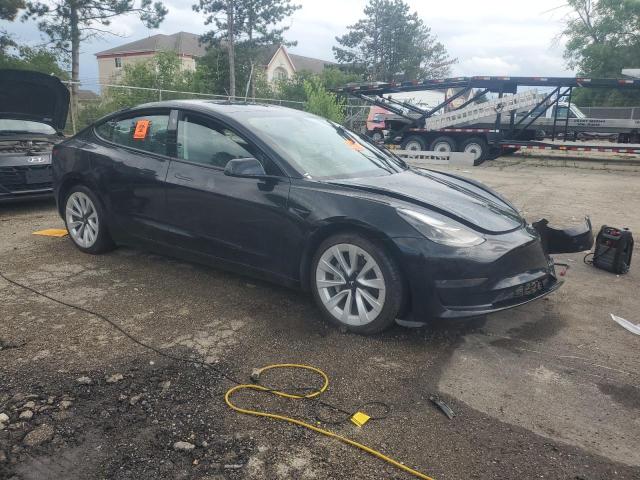 Photo 4 from auction – 2022 TESLA MODEL 3 with VIN 5YJ3E1EA0NF369309