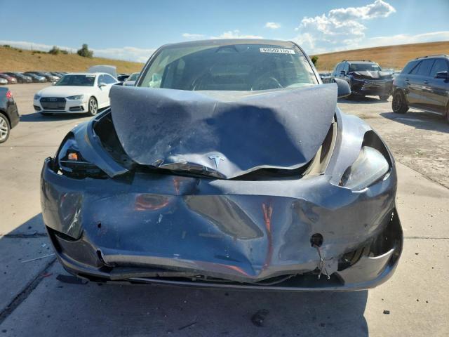 Photo 5 from auction – 2023 TESLA MODEL Y with VIN 7SAYGDEE3PA200229
