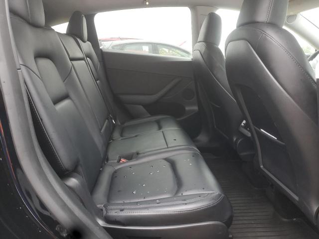 Photo 10 from auction – 2023 TESLA MODEL Y with VIN 7SAYGAEE4PF857946