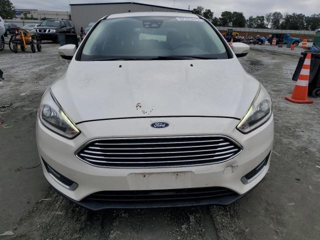 Photo 5 from auction – 2016 FORD FOCUS TITANIUM with VIN 1FADP3N22GL212468