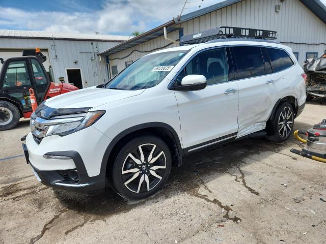 Photo 1 from auction – 2022 HONDA PILOT ELIT with VIN 5FNYF6H09NB029904