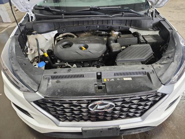 Photo 12 from auction – 2021 HYUNDAI TUCSON SE with VIN KM8J2CA46MU288201