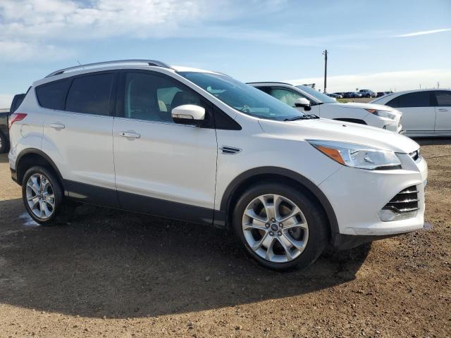 Photo 4 from auction – 2015 FORD ESCAPE TIT with VIN 1FMCU9J93FUC51031
