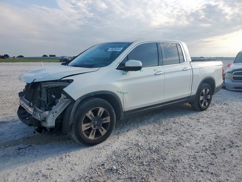 HONDA RIDGELINE 2018 with VIN 5FPYK3F70JB014137 - Photo from auction